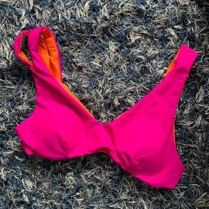 Hot pink bikini top with orange inside
